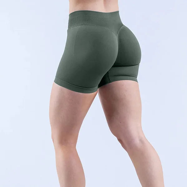 woman wearing a soft, breathable yoga shorts in a high-waisted fit—perfect for workouts, yoga, or relaxed summer days.