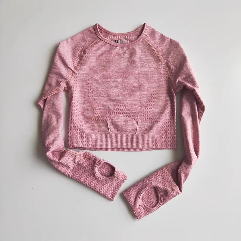 long-sleeve yoga crop top with a built-in bra in pink—perfect for workouts, yoga sessions, or summer activewear.