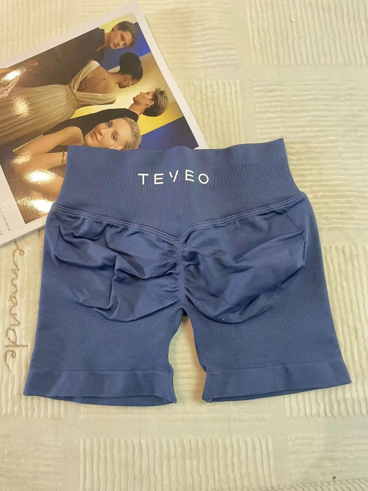 blue soft, breathable yoga shorts in a high-waisted fit—perfect for workouts, yoga, or relaxed summer days.