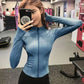 Woman wearing sleek fit yoga jacket for workouts and summer jogging