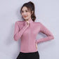 Woman wearing pink sleek fit yoga jacket for workouts and summer jogging