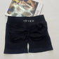 black soft, breathable yoga shorts in a high-waisted fit—perfect for workouts, yoga, or relaxed summer days.
