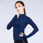 Woman wearing sleek fit yoga jacket for workouts and summer jogging