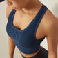 Navy blue mesh breathable gym top for women, quick-dry activewear perfect for summer workouts and swimwear.