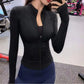 Woman wearing black sleek fit yoga jacket for workouts and summer jogging
