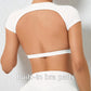 Woman wearing a white backless workout crop top with breathable, stretchy fabric — perfect for running, gym workouts, cycling, and outdoor activities.