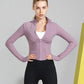Woman wearing sleek fit yoga jacket for workouts and summer jogging